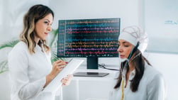 female-patient-in-a-neurology-lab-doing-eeg-scan-2021-08-27-10-00-16-utc